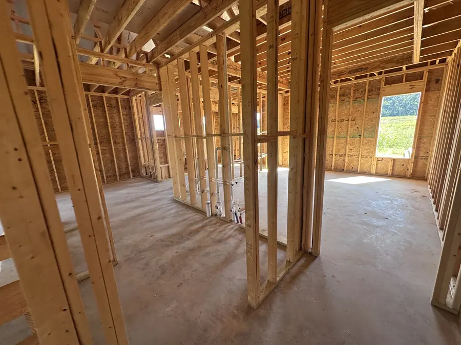 Framing in progress on a new custom home by Still Oak Homes